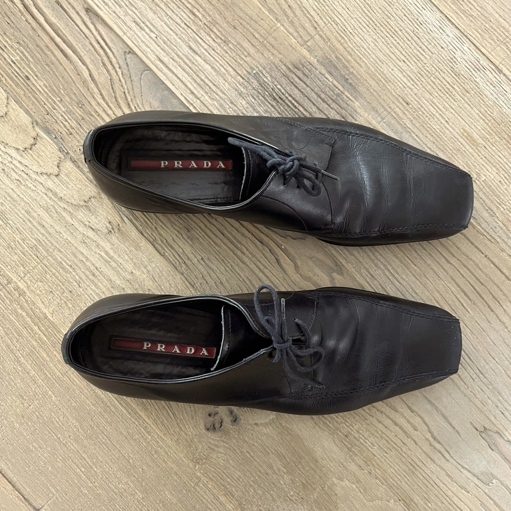PRADA men’s dress shoes, size us 8. Excellent condition, small marking at toes.